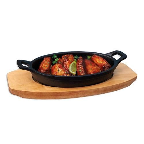 Serving pan on a wooden base. 17*12 cm oval cast iron P.L. Proff Cuisine