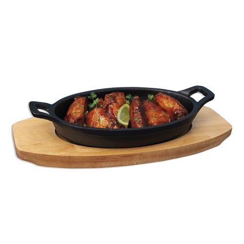 Serving pan on a wooden base. 21*15 cm oval cast iron P.L. Proff Cuisine